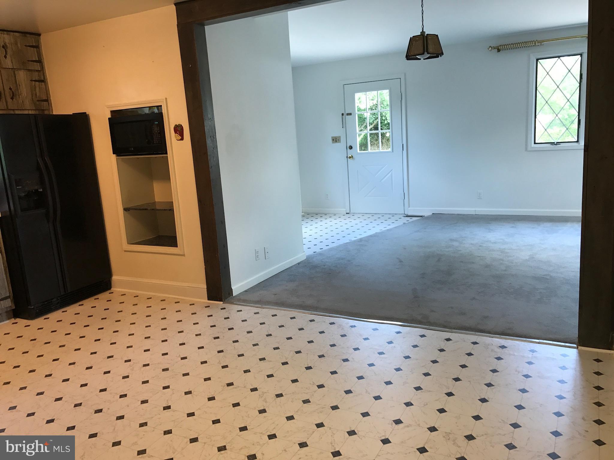 6700 Surratts Road Clinton, MD 20735 - Photo 12 of 30 Kitchen Leads Into Family Room
