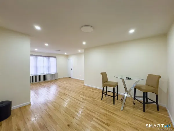 a view of a room with a wooden walls