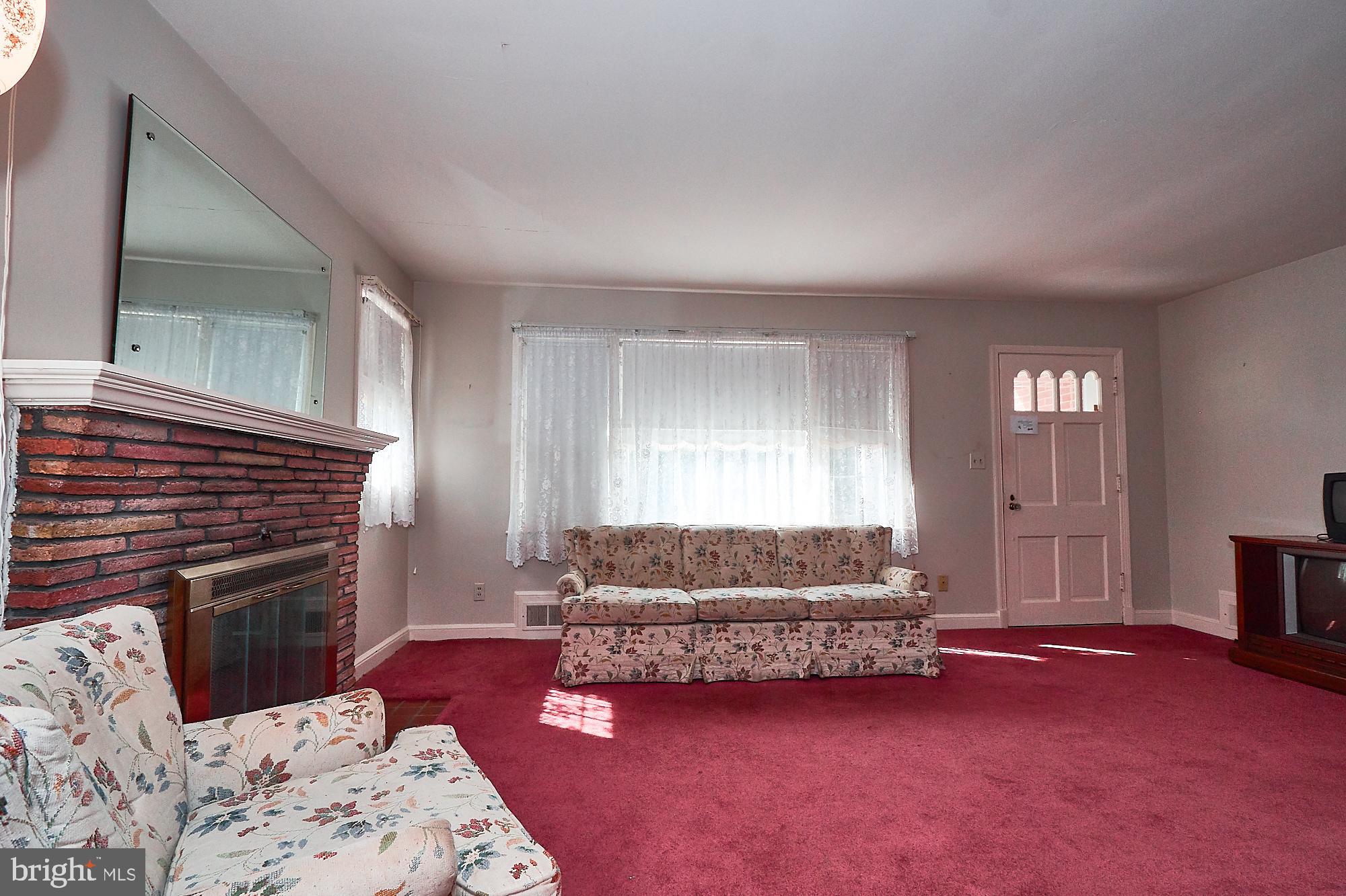 25625 Ridge Road Damascus, MD 20872 - Photo 3 of 18 Hardwood floors under this carpet.