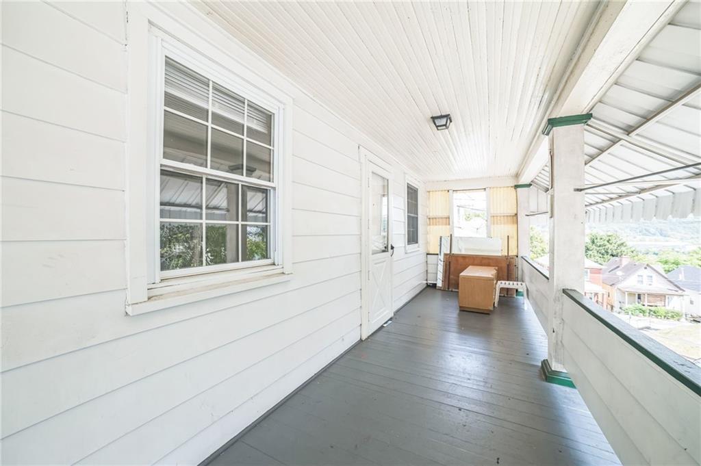 504 1st Street Charleroi, PA 15022 - Photo 5 of 18 a living room with furniture and a large window