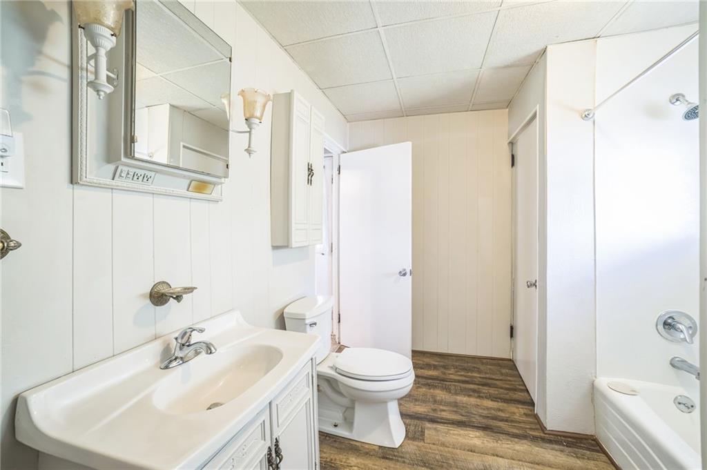 504 1st Street Charleroi, PA 15022 - Photo 8 of 18 a bathroom with a sink toilet and shower