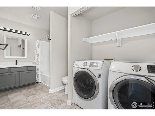 a view of a hallway with stairs