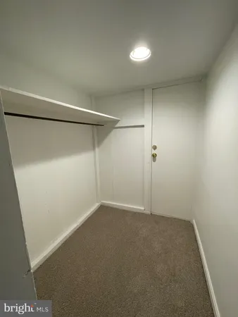 a bathroom with a toilet a sink and bathtub