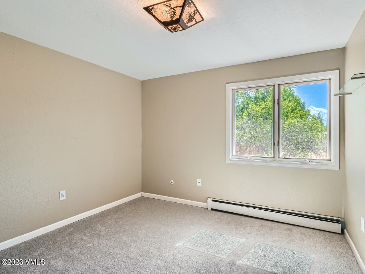 25 Snow Owl Eagle, CO 81631 - Photo 13 of 37 an empty room with a window