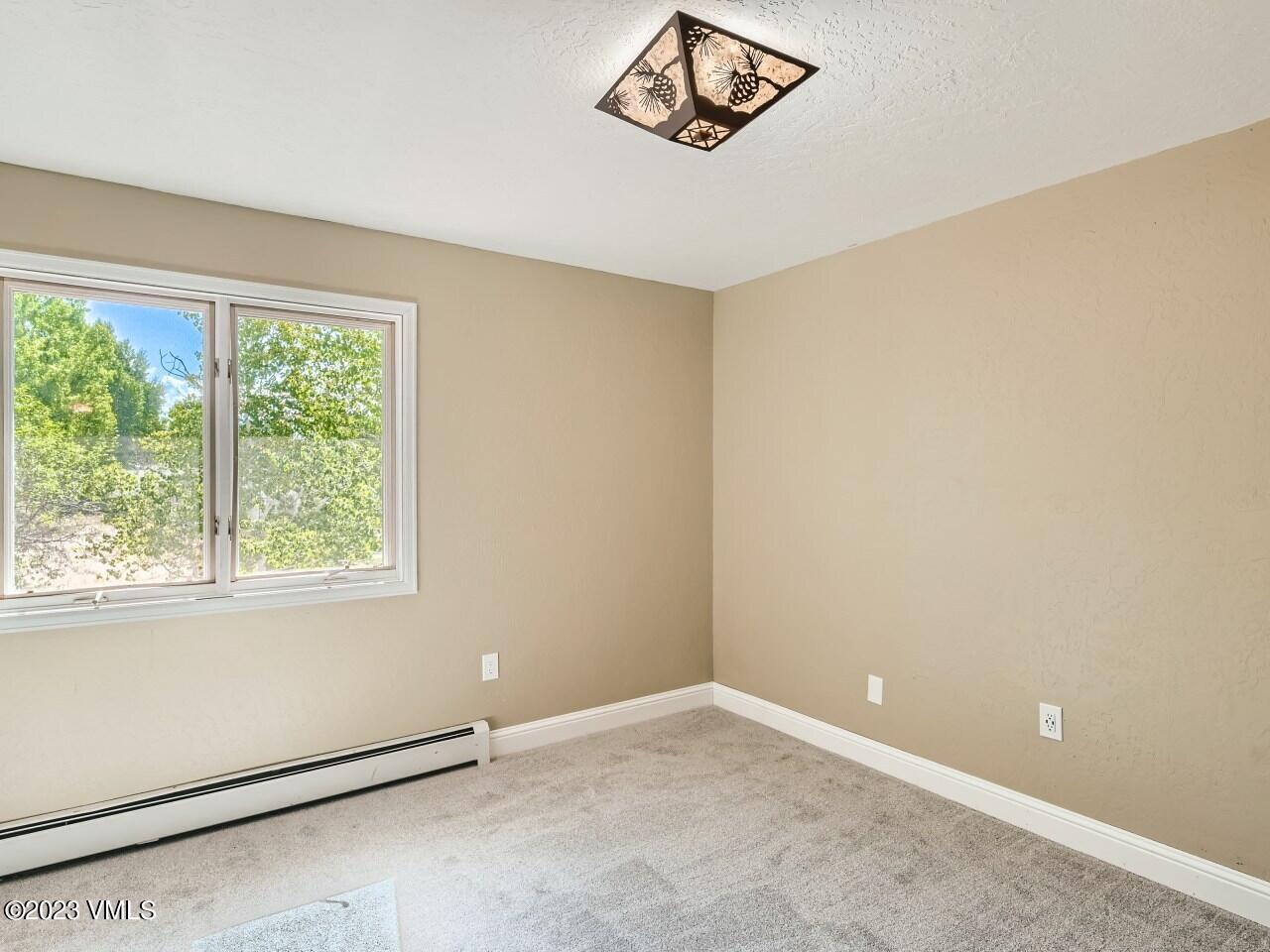 25 Snow Owl Eagle, CO 81631 - Photo 15 of 37 an empty room with a window