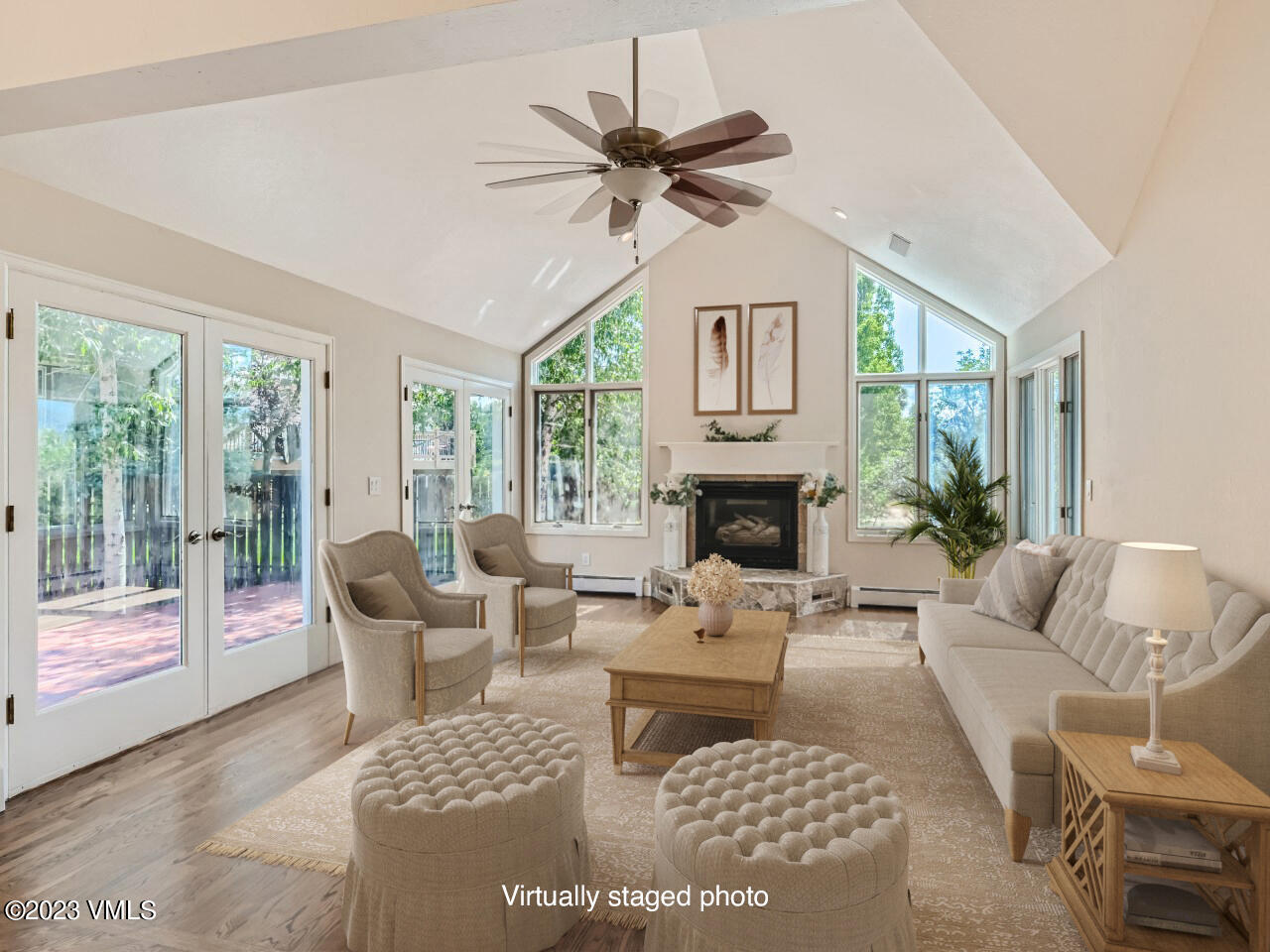 25 Snow Owl Eagle, CO 81631 - Photo 2 of 37 a living room with furniture a large window and a table