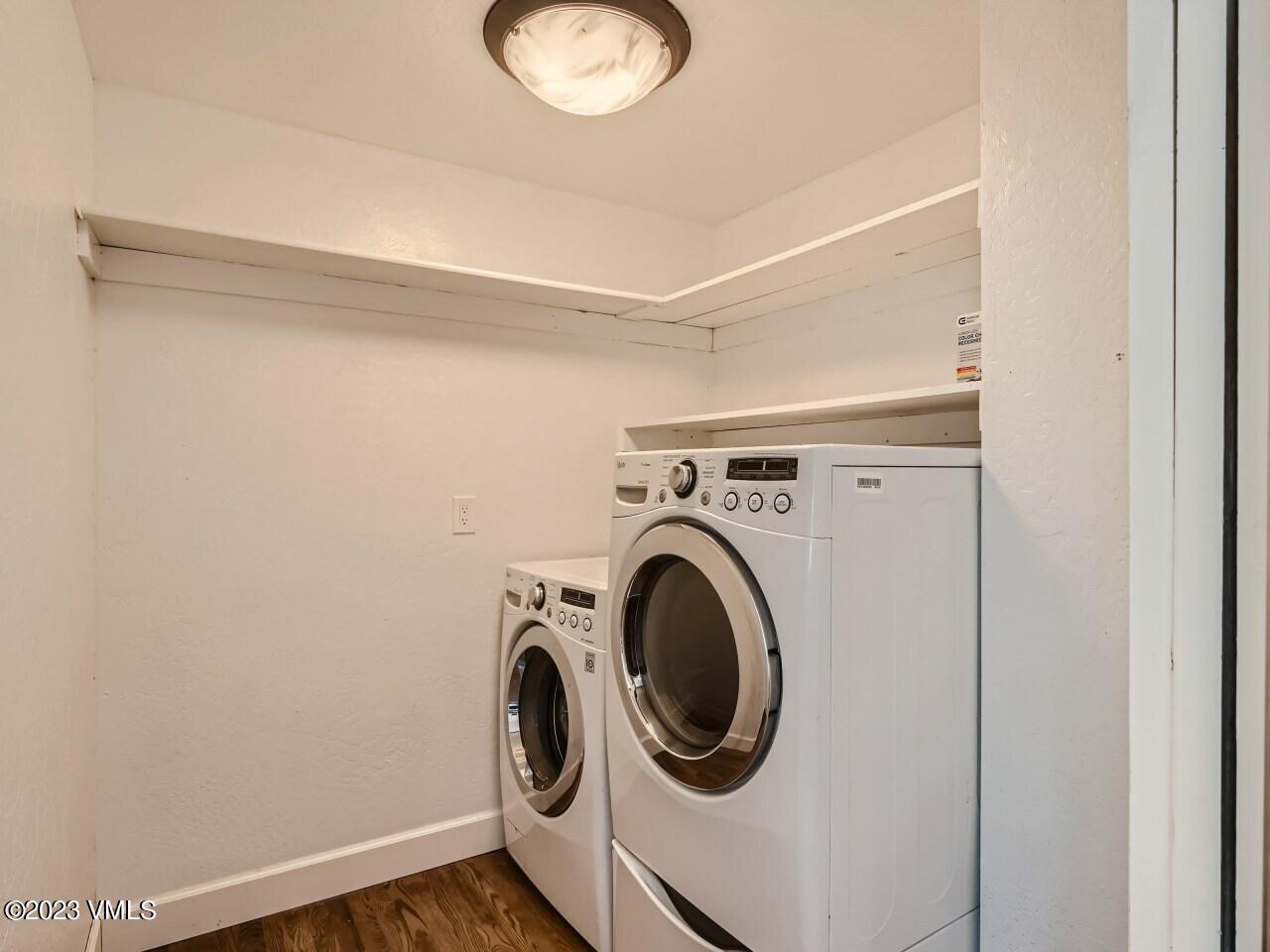 25 Snow Owl Eagle, CO 81631 - Photo 23 of 37 a utility room with dryer and washer