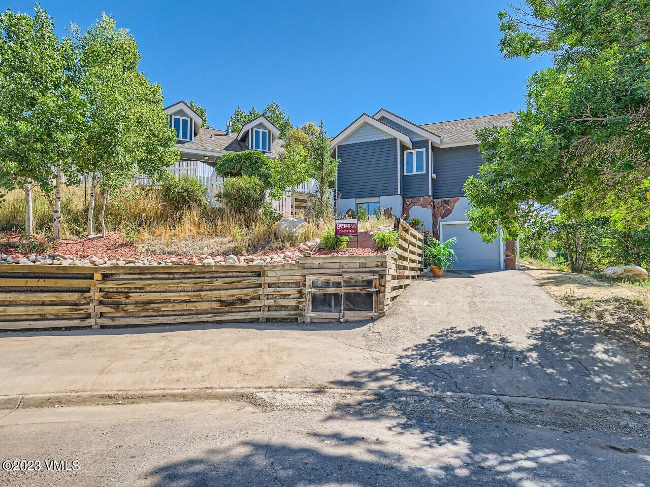 25 Snow Owl Eagle, CO 81631 - Photo 3 of 37 a front view of a house with a yard