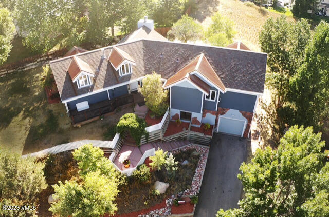 25 Snow Owl Eagle, CO 81631 - Photo 32 of 37 a view of a house with a yard and sitting area