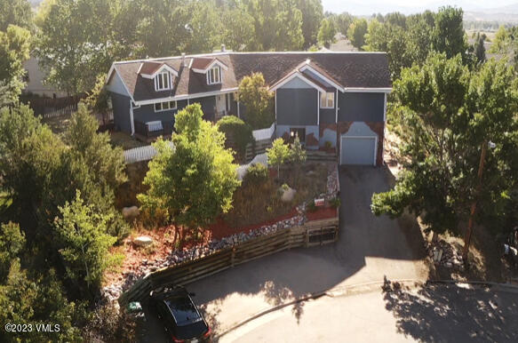 25 Snow Owl Eagle, CO 81631 - Photo 33 of 37 an aerial view of a house with a yard basket ball court and outdoor seating