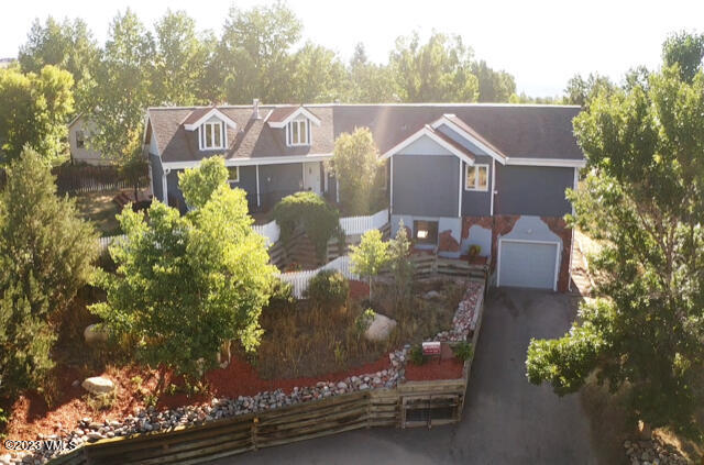 25 Snow Owl Eagle, CO 81631 - Photo 36 of 37 a view of a house with a yard and sitting area