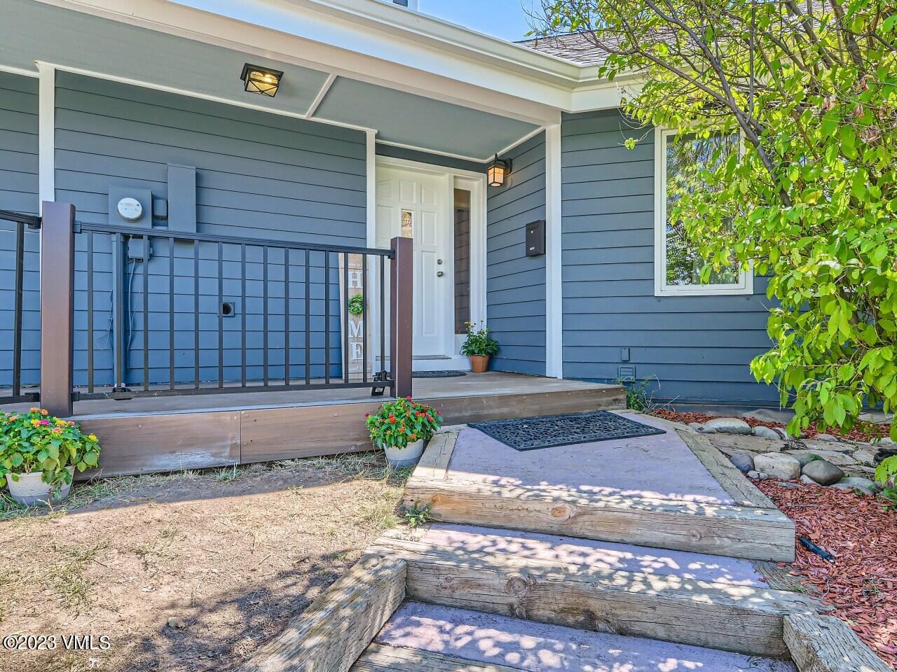 25 Snow Owl Eagle, CO 81631 - Photo 5 of 37 a front view of a house with garden