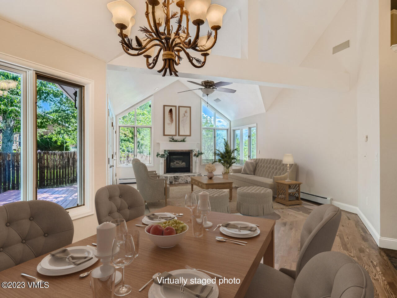 25 Snow Owl Eagle, CO 81631 - Photo 7 of 37 a living room with furniture a fireplace and a chandelier