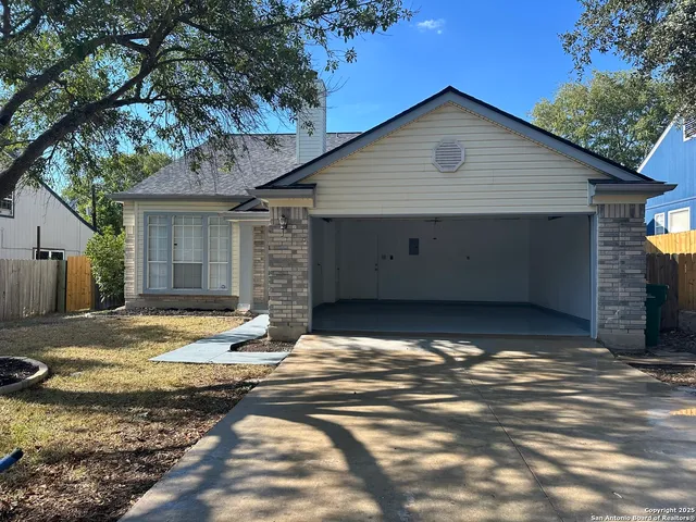 a house view with a backyard space
