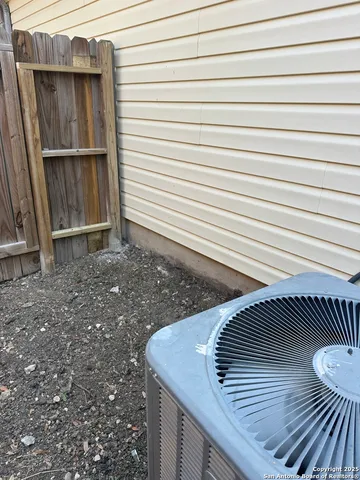 a backyard of a house with seating space