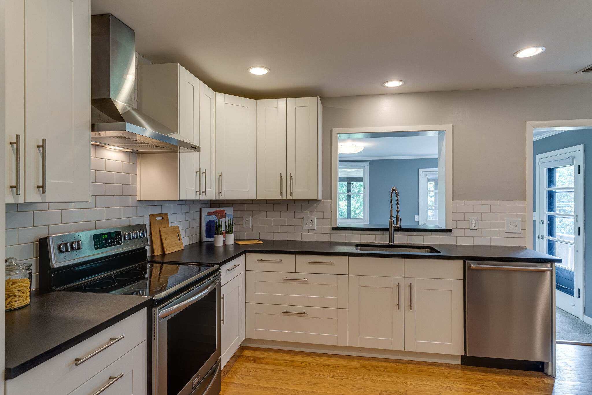 3512 Pleasant Valley Road Nashville, TN 37204 - Photo 11 of 40 a kitchen with granite countertop a sink and cabinets