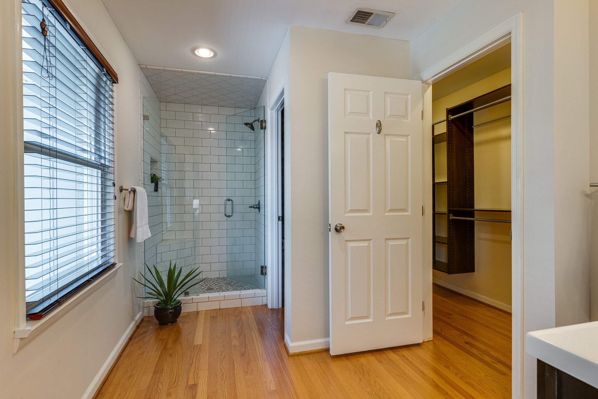3512 Pleasant Valley Road Nashville, TN 37204 - Photo 21 of 40 a bathroom with a glass door shower and a mirror