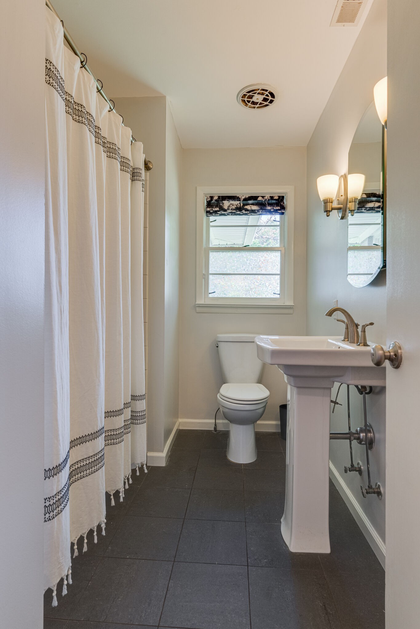 3512 Pleasant Valley Road Nashville, TN 37204 - Photo 23 of 40 a bathroom with a sink toilet and shower