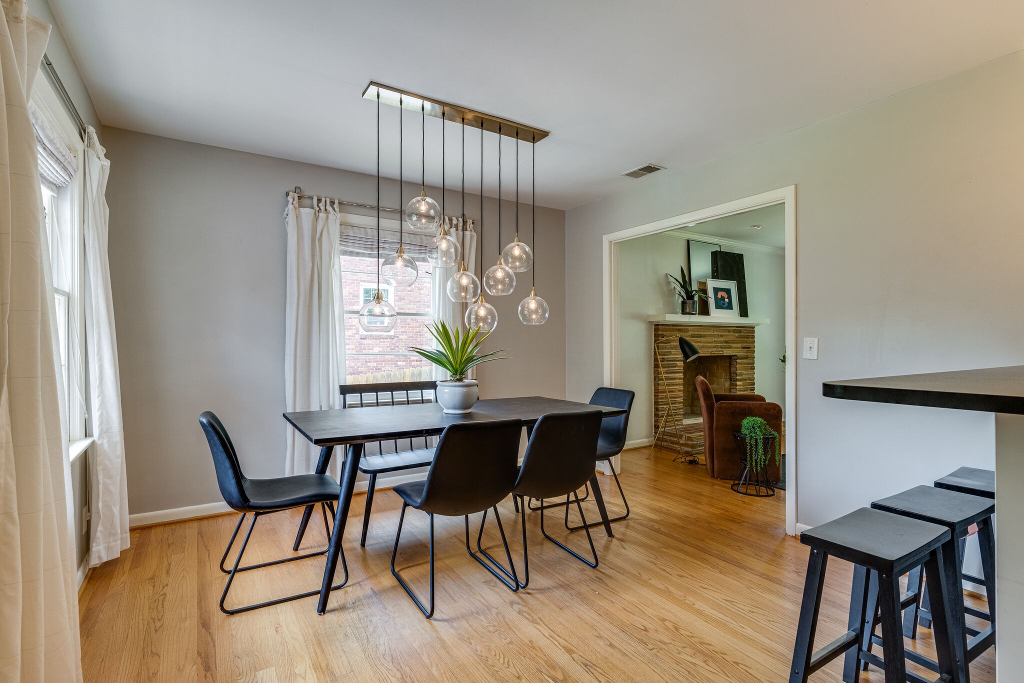3512 Pleasant Valley Road Nashville, TN 37204 - Photo 9 of 40 a view of a dining room with furniture and wooden floor