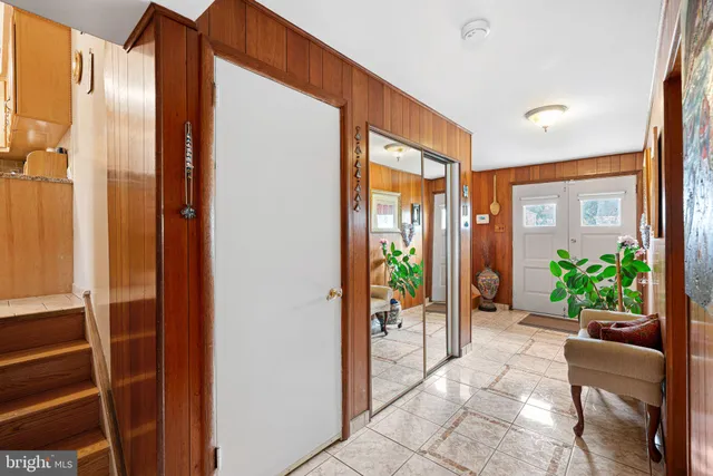 a view of an entryway door and an outdoor space