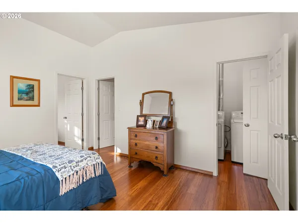 a bedroom with a bed and a view of bathroom