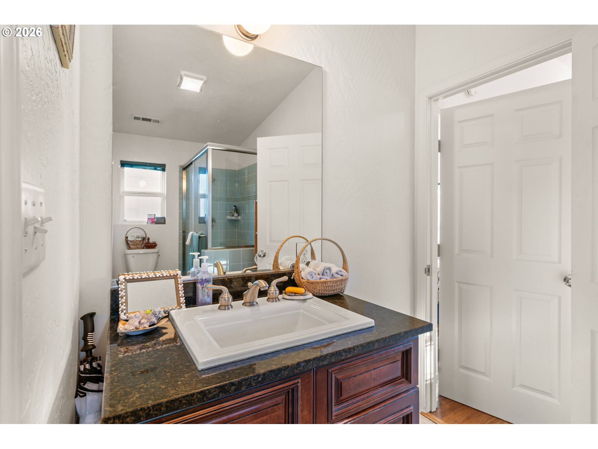 1115 Ransom Avenue Brookings, OR 97415 - Photo 15 of 32 a living room with a bed furniture and a window