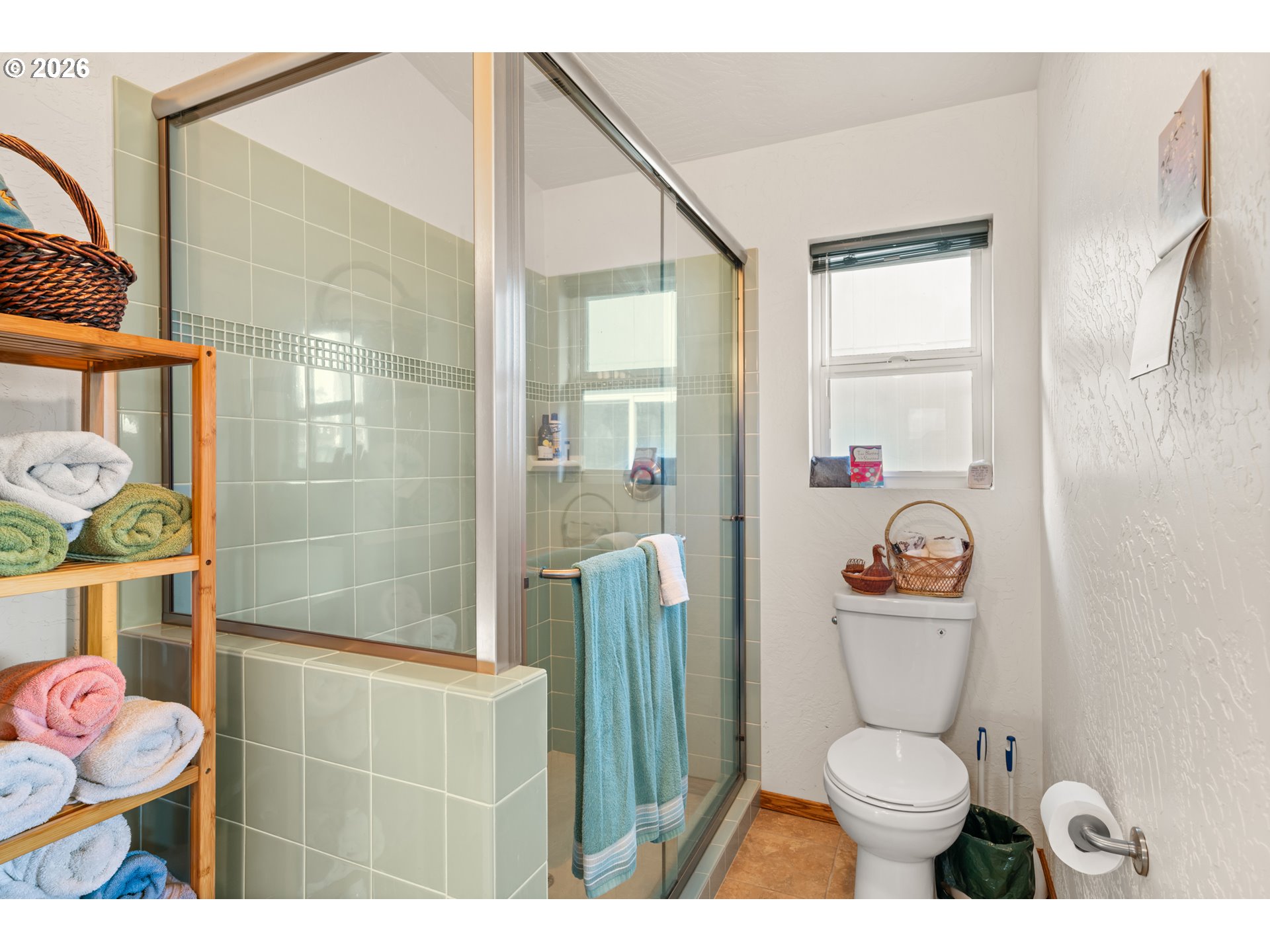 1115 Ransom Avenue Brookings, OR 97415 - Photo 16 of 32 a bathroom with a sink a toilet and shower