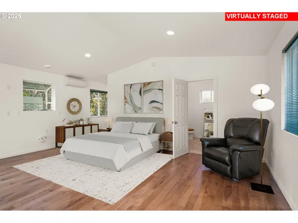 a bedroom with a bed and furniture