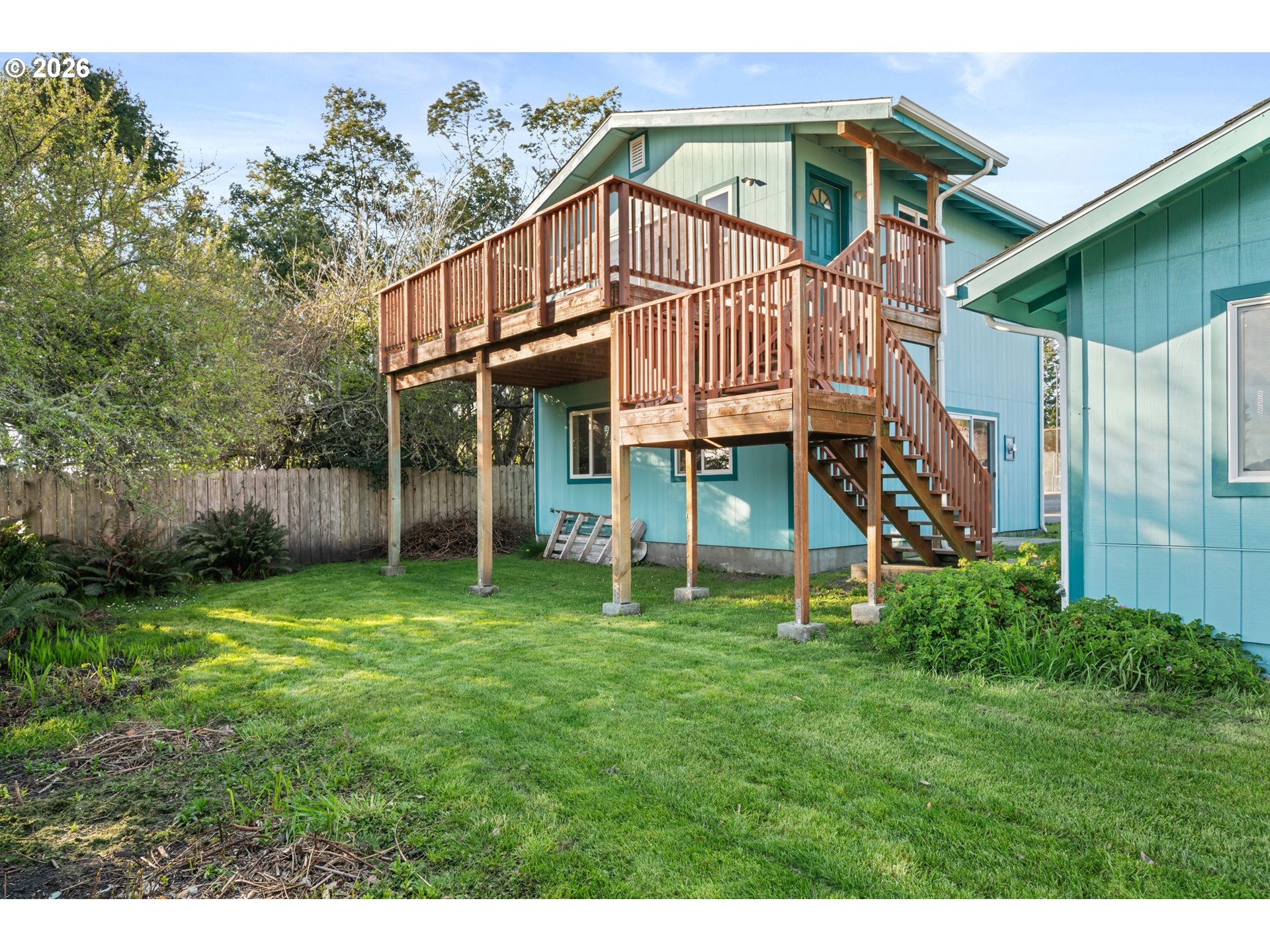1115 Ransom Avenue Brookings, OR 97415 - Photo 25 of 32 a view of a house with a yard