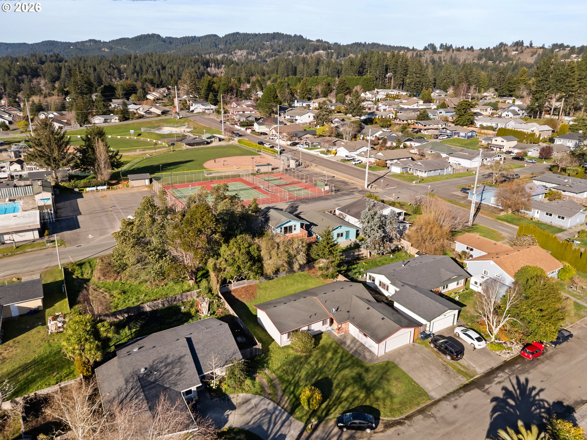 1115 Ransom Avenue Brookings, OR 97415 - Photo 29 of 32 an aerial view of residential houses with outdoor space
