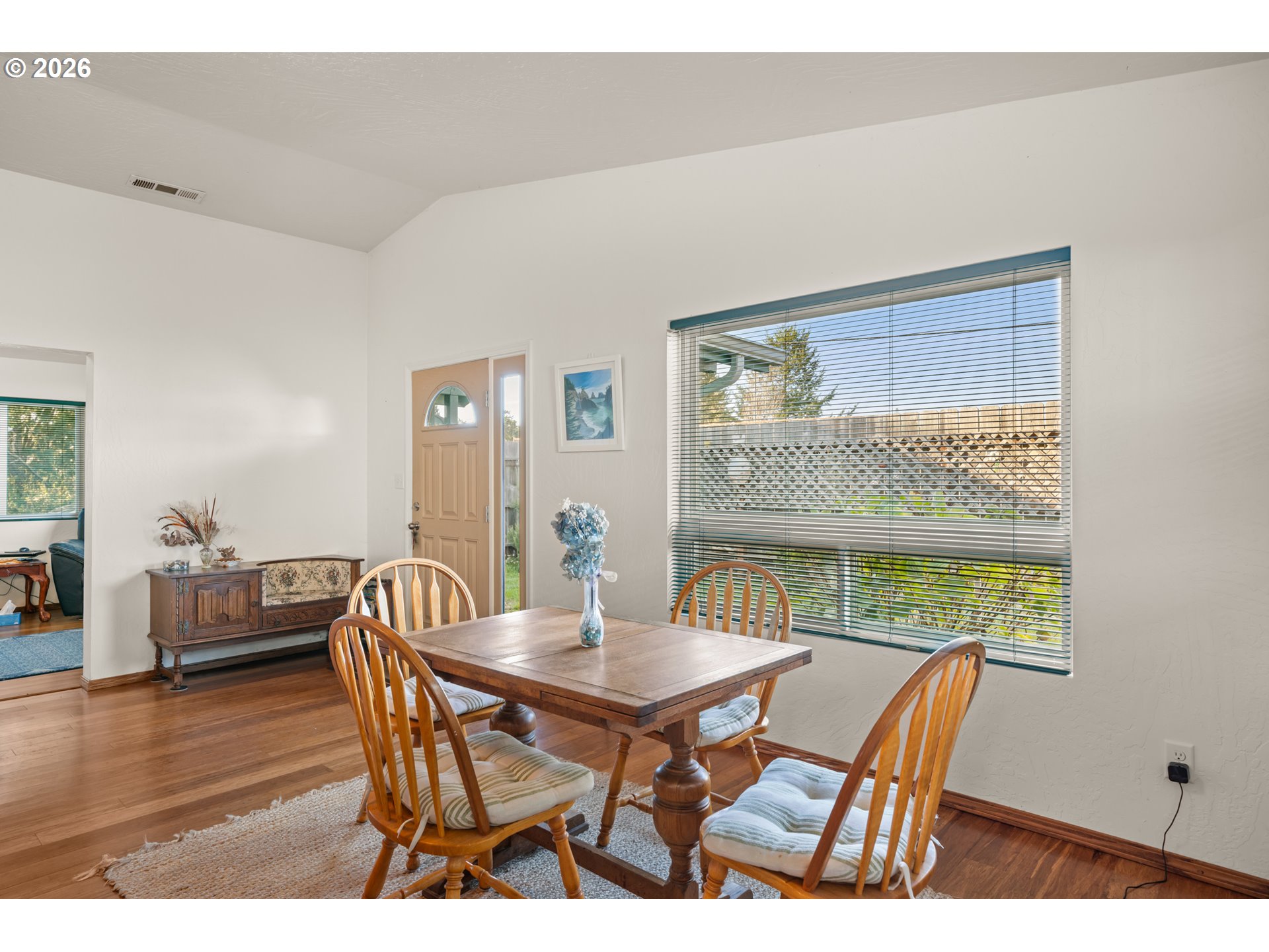 1115 Ransom Avenue Brookings, OR 97415 - Photo 5 of 32 a view of a dining room with furniture window and wooden floor
