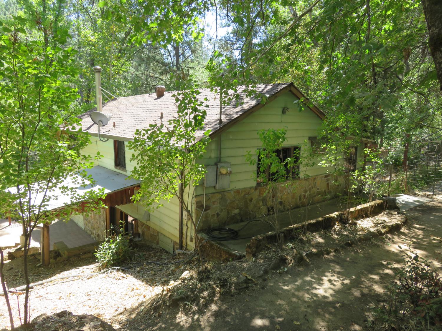 2563 Woodhouse Mine Road West Point, CA 95255 - Photo 13 of 49 a backyard of a house with lots of green space