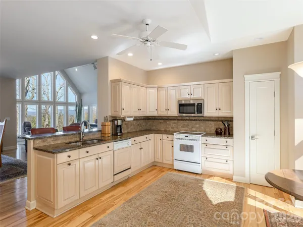 a large kitchen with cabinets
