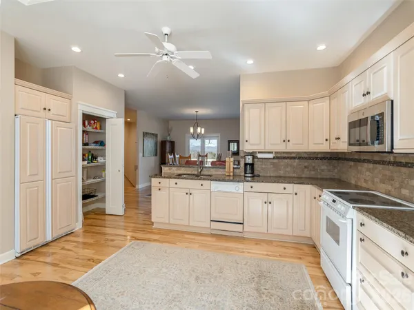 a large kitchen with cabinets