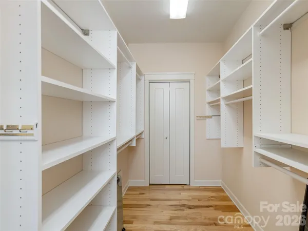 a view of an empty walk in closet