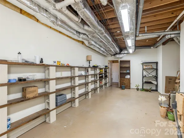 a view of a two chairs in the balcony