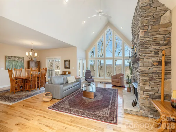 a living room with furniture and a table