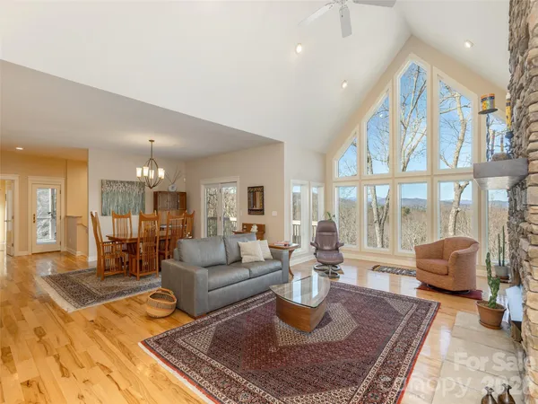 a living room with furniture or couch and a large window
