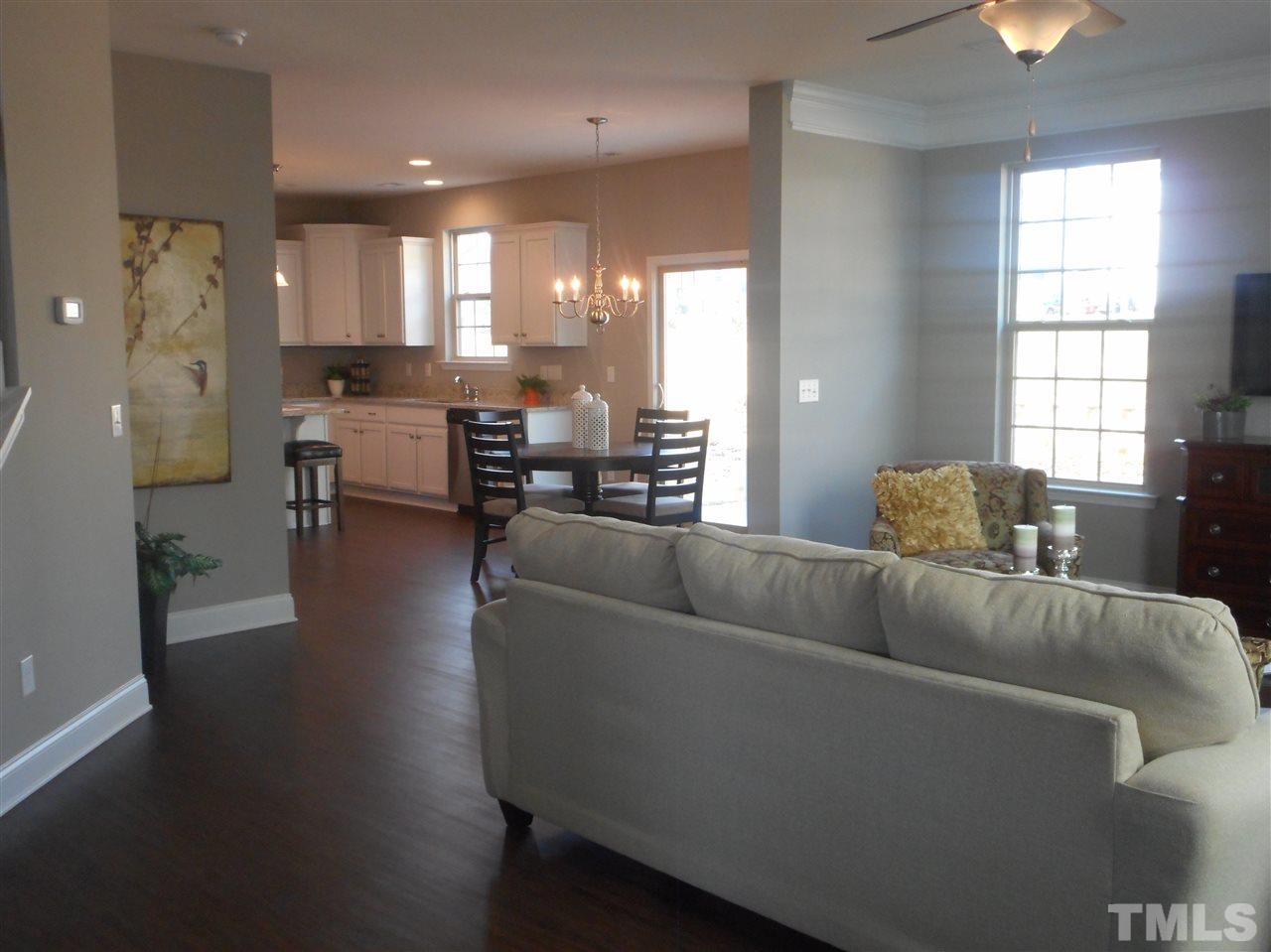 1509 Bentons Ridge Drive Raleigh, NC 27610 - Photo 11 of 23 a living room with furniture and wooden floor