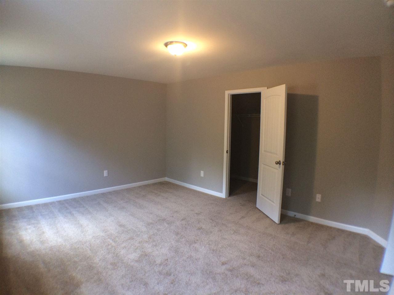 1509 Bentons Ridge Drive Raleigh, NC 27610 - Photo 17 of 23 an empty room with an entryway