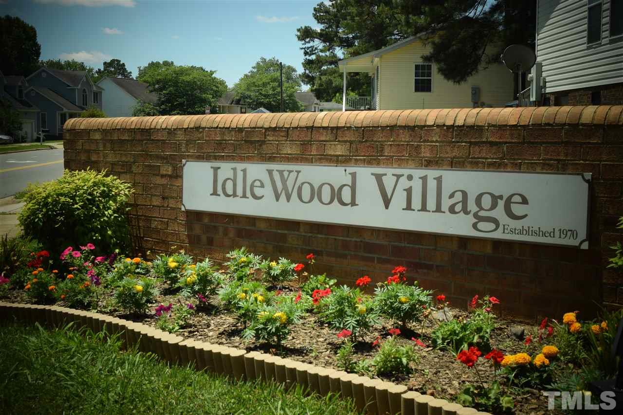 1509 Bentons Ridge Drive Raleigh, NC 27610 - Photo 22 of 23 a view of sign board with flowers