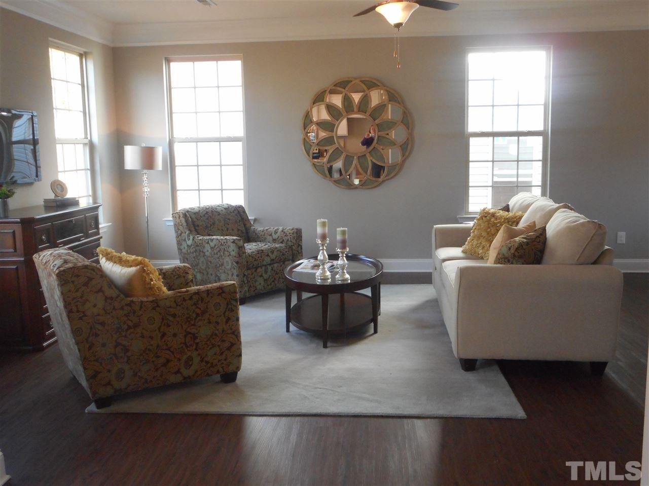 1509 Bentons Ridge Drive Raleigh, NC 27610 - Photo 10 of 23 a living room with furniture and a large window