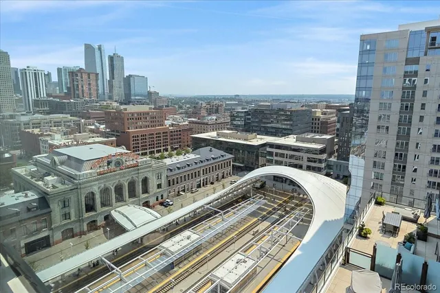 a view of city with tall buildings