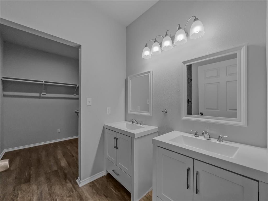 2 Bowling Lane Blue Ridge, TX 75424 - Photo 6 of 14 a bathroom with a sink a light fixture and a mirror