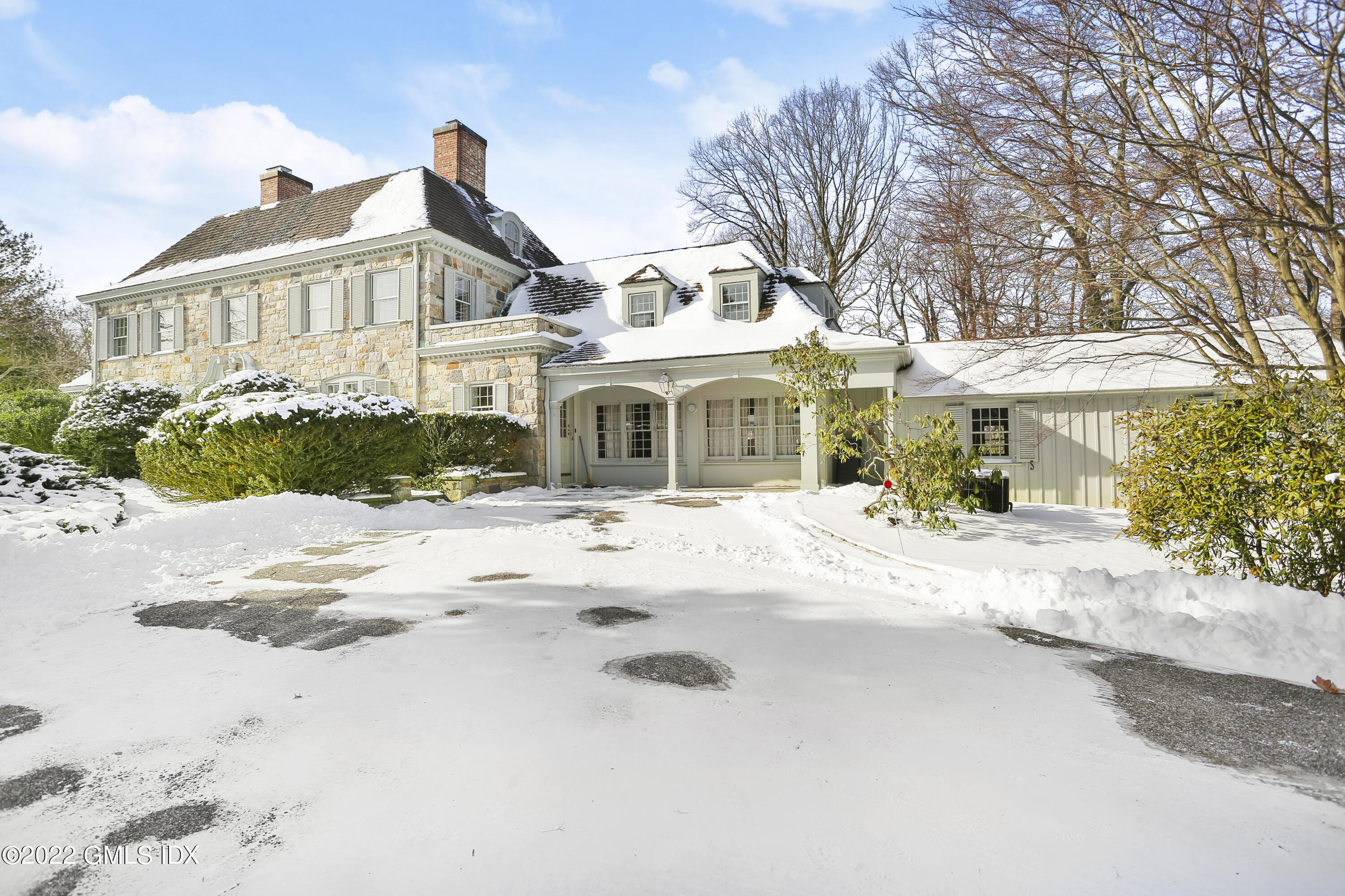 34 Cathlow Drive Riverside, CT 06878 - Photo 2 of 14 a front view of a house with a yard
