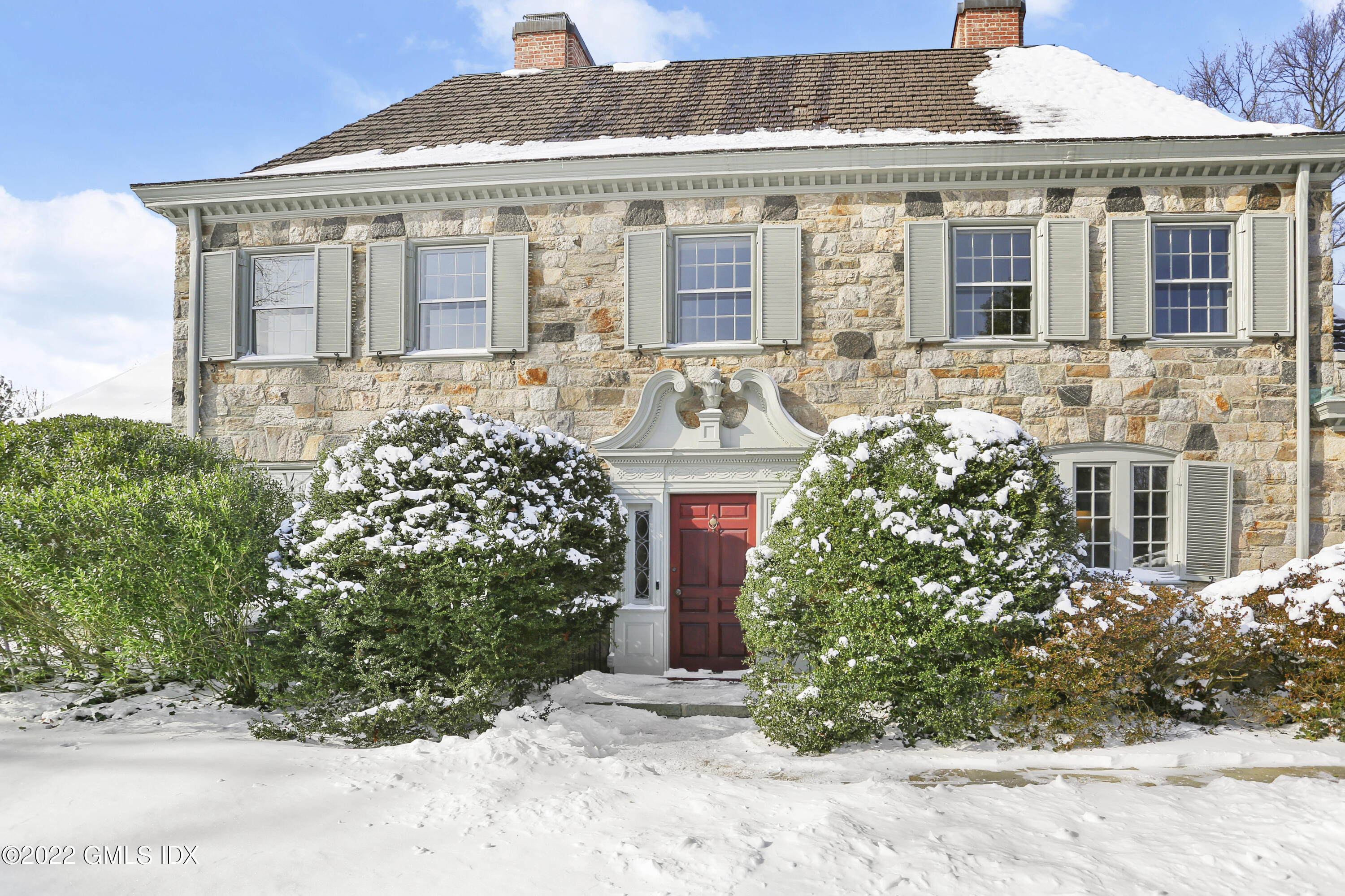 34 Cathlow Drive Riverside, CT 06878 - Photo 3 of 14 front view of a house with a yard
