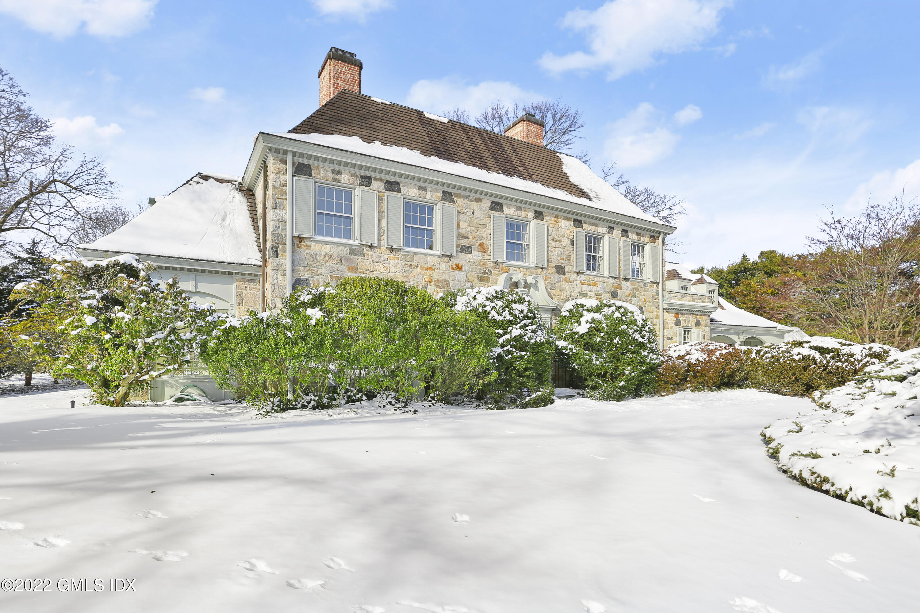 34 Cathlow Drive Riverside, CT 06878 - Photo 5 of 14 a front view of a house with a yard
