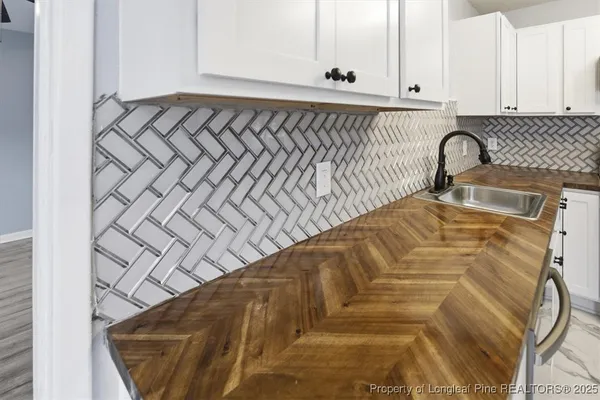 a close view of a sink and a mirror