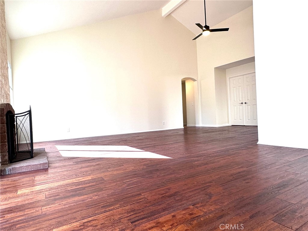 183 South Starflower Street Brea, CA 92821 - Photo 16 of 42 a view of empty room with wooden floor and fan