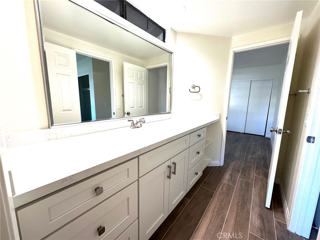 183 South Starflower Street Brea, CA 92821 - Photo 27 of 42 a bathroom with a double vanity sink and mirror